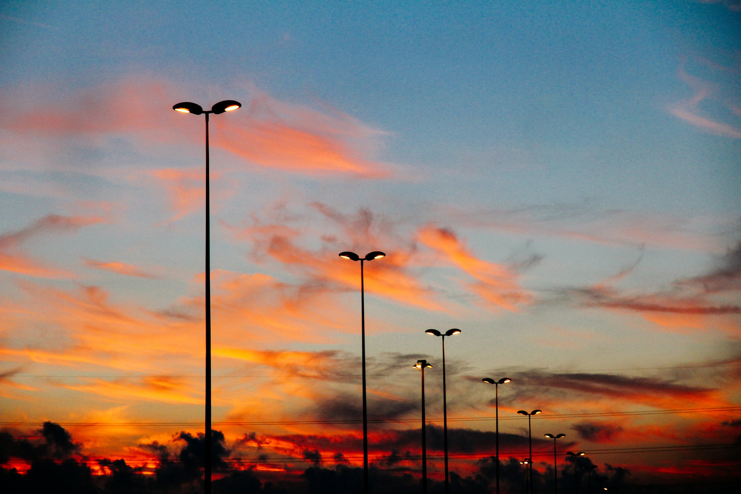 Photo of street lamps during dawn
